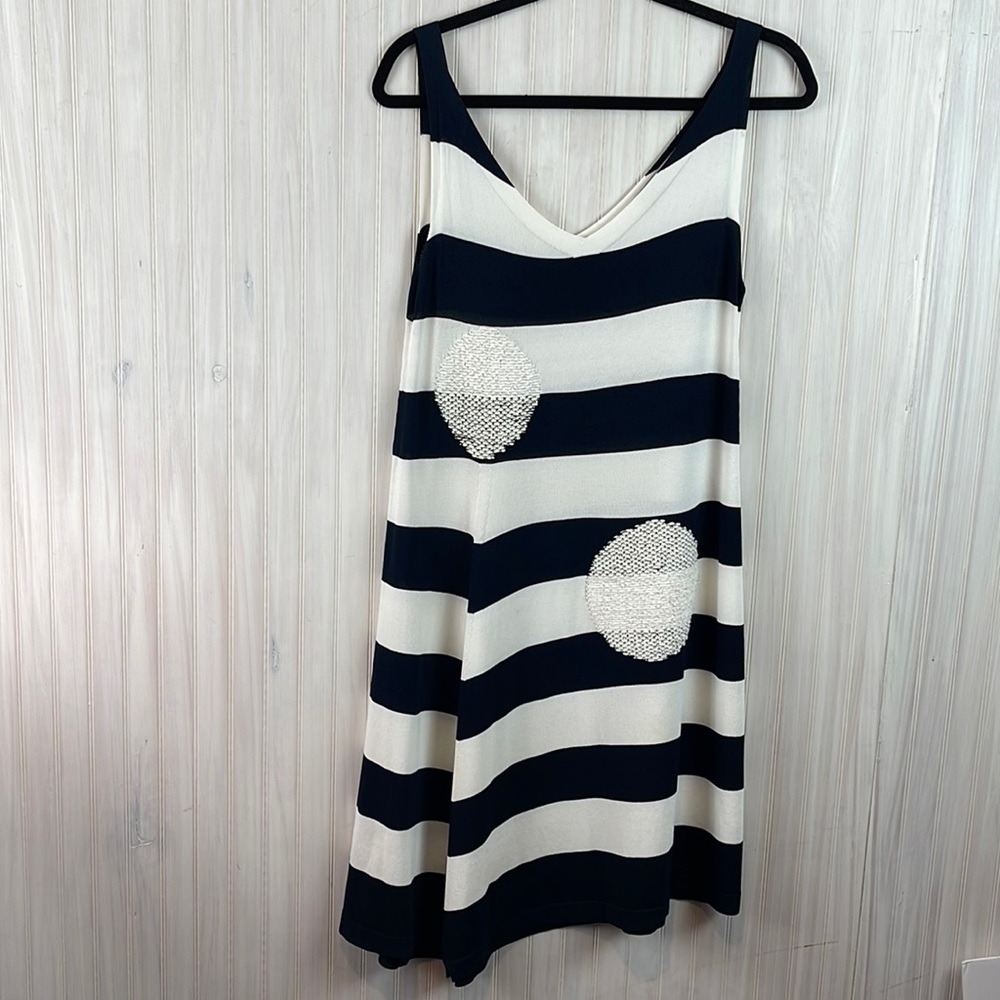 - D. EXTERIOR STRIPED ASYMMETRICAL DRESS